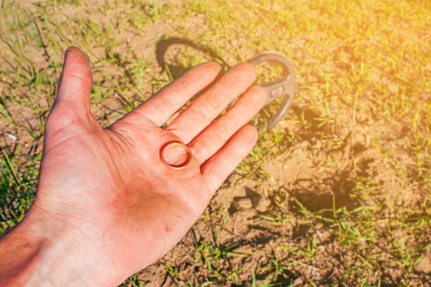 gold ring found while searching with a metal detector, jewelry found from the ground