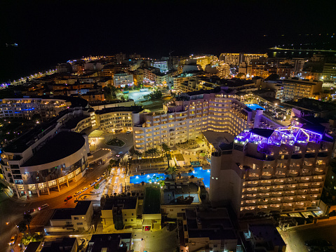 St. Paul's Bay Malta hotels at night aerial illuminated Bugibba and Qawra tourist destinations wide view. Date: 25.10.2023 St. Paul's Bay, Malta.