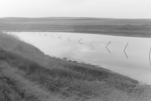 A slough in Saskatchewan. The image is from old black and white film in 1976.