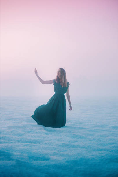istock Young woman explores winter landscape 2016119284