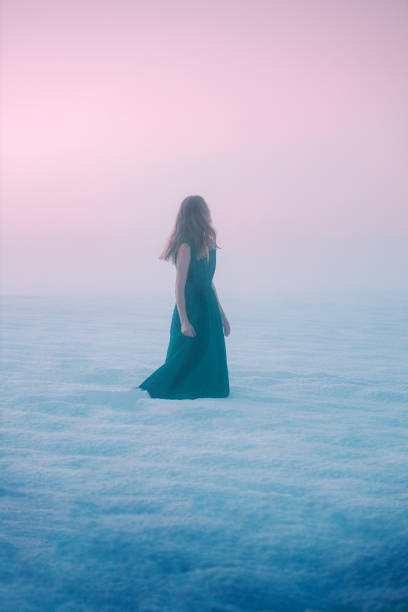 istock Young woman explores winter landscape 2016119789