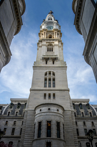 The tower of Philadelphia City Hall stands 548 feet above the very center of the city. City hall was under construction from 1871 to 1901, and its tower was the tallest structure in Philadelphia until One Liberty Tower surpassed it in 1986. \n\nCity Hall still is the tallest masonry building in the world. The tower is not built on a steel skeleton.\n\nHere, the tower is seen from just inside the south portal of the building.