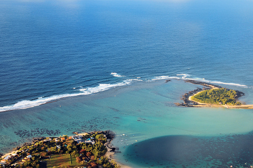 Le Chaland, Plaine Magnien / Plaisance, Grand Port District, Mauritius: entrance to the protected lagoon of  Blue Bay Marine Park from the air, limited by the reef, where the Indian Ocean waves can be seen breaking - a marine protected area in the southeast of Mauritius, the 353 hectare area was declared a national park 1997 and in 2000 it was granted Marine Park status, in 2008 it was designated a 