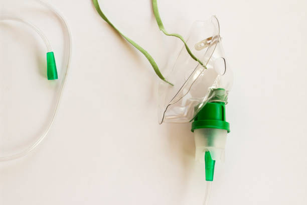istock Green color,oxygen mask on white with copy space 2016243598