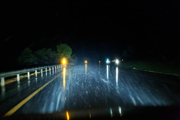 istock Dark Night Expressway Curve Motion Blur Torrential Rain 2016246179