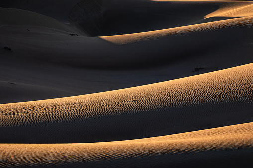 Sahara Desert sand dunes background. Popular travel destination, Erg Chebbi, Sahara Desert, Morocco.