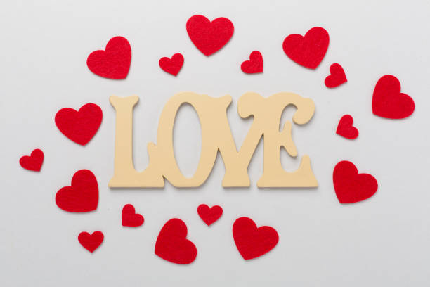 Valentines day composition with gifts on color background, top view.