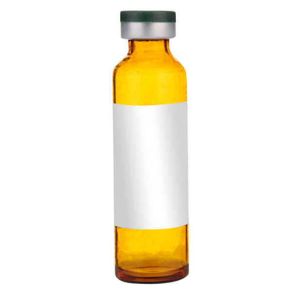 istock Amber Glass Medicine Bottle with Green Cap 2016310963