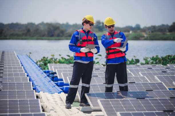 istock Software engineers upgrade energy app. Using real-time monitoring on floating solar farming. 2016334019