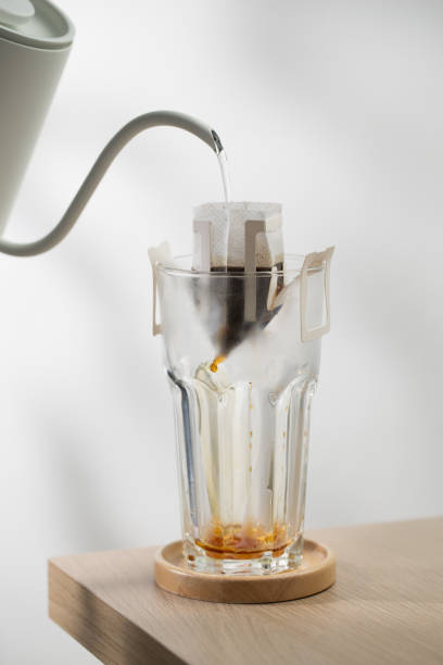 istock Brewing coffee through pre-made paper filters. 2016379057