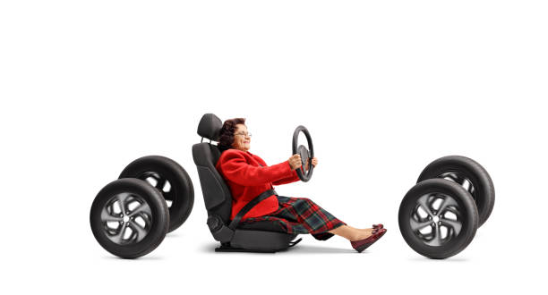 istock Elderly female driver in a car seat driving 2016488677
