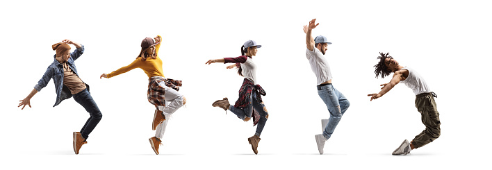 Group of young people dancing one behind other isolated on white background