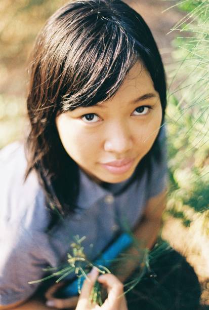 asian woman in nature