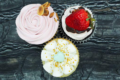Closeup of three cupcakes