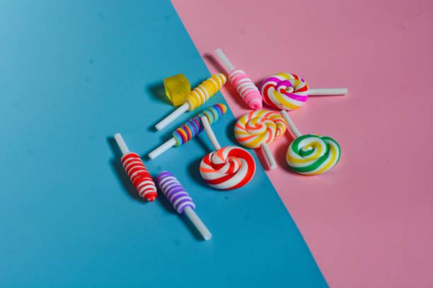 istock Flat lay close up sweet snack with assorted blueberries, blackberries, strawberries, chocolate, cotton candy, candies 2016561478