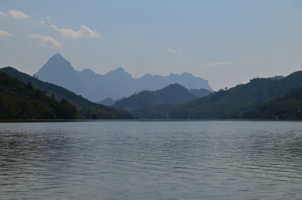 Floating raft houses and Wooden Rural huts in Laos. stock photo