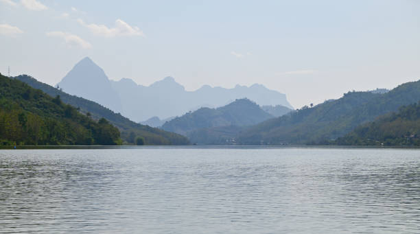 Floating raft houses and Wooden Rural huts in Laos. stock photo