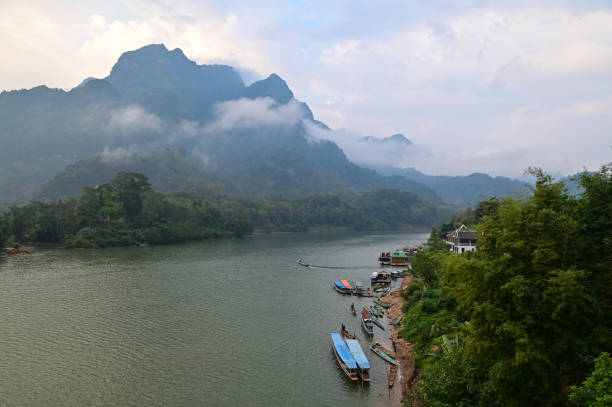 Floating raft houses and Wooden Rural huts in Laos. stock photo