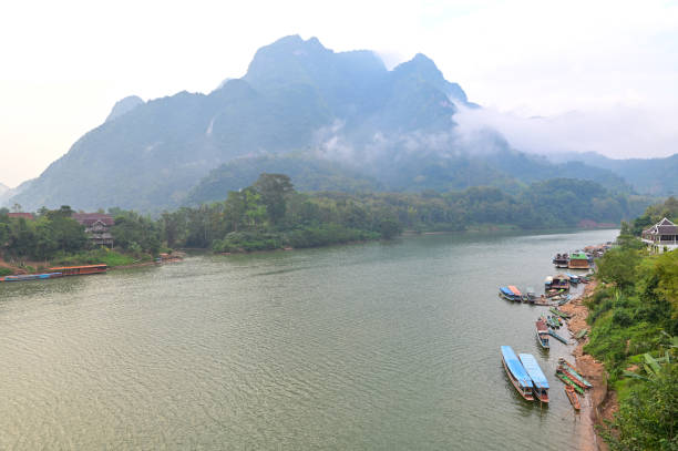 Floating raft houses and Wooden Rural huts in Laos. stock photo