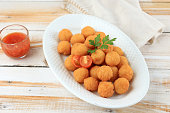 Potato Croquettes or Potato Ball Pom Pom with Red Sauce