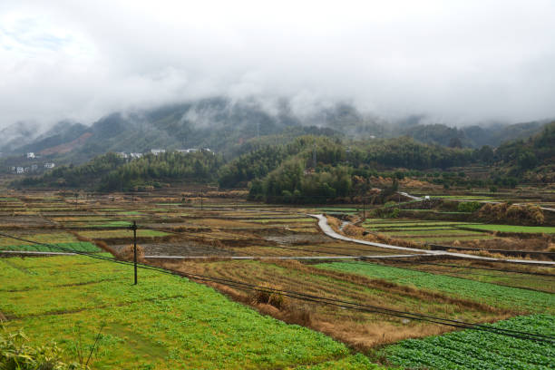 the ancient village in the morning, beautiful clouds moving up and down in the mountains