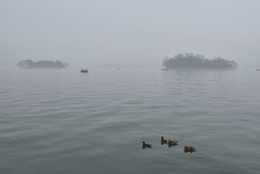 the West Lake has gained a worldwide reputation for its picturesque lakes and hills as well as a myriad of places of interest in Zhejiang province, China.