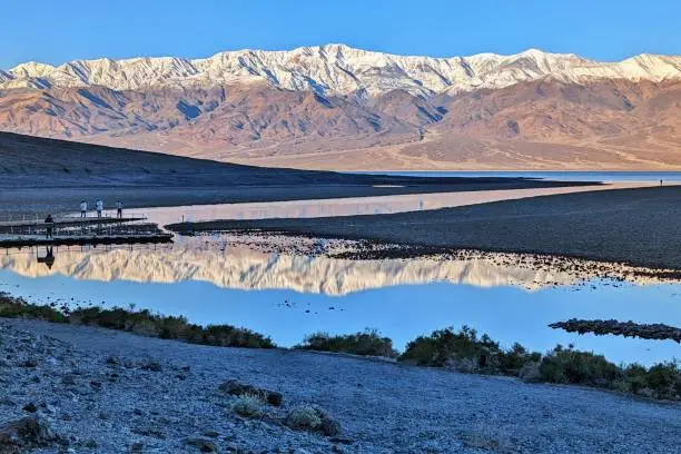 View of Badwater Basin at dawn, with the Panamint Range and Telescope Peak in the background