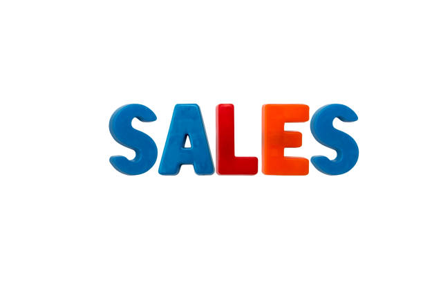 Sales written with letter magnets isolated on white