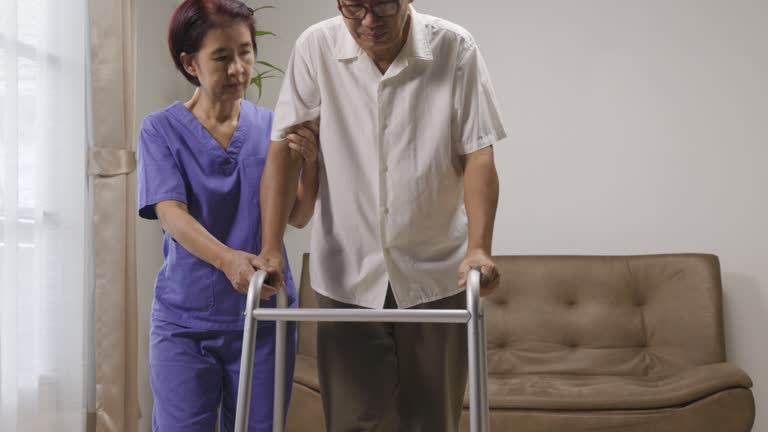 Caregiver takecare older man that having Sarcopenia or muscle loss. Sarcopenia is a degenerative disease of the muscle usually caused by the natural consequence of aging.