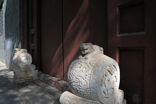 Ancient stone lion at the gate, Beijing