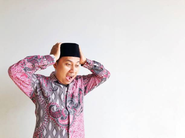 istock Asian Muslim man with happy surprised expression 2016916492