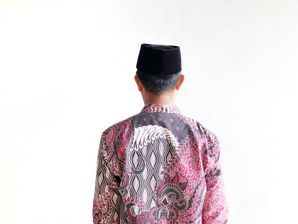 Muslim Asian man with his back to the camera
