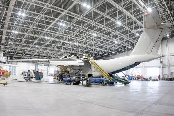 istock White transport airplane in the aviation hangar 2016943133