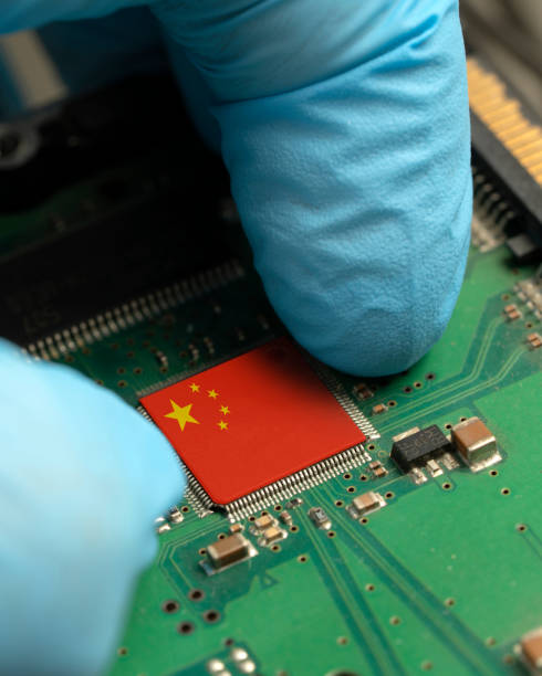 istock CPU chip on motherboard - with microcircuits and other computer parts 2016974494