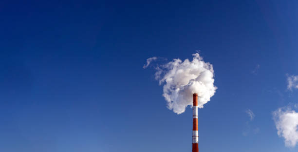 Factory pipe polluting air, smoke from chimneys. environmental problems, ecological theme. Banner copy space
