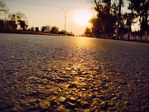 This is a highway and the photo is captured late evening.