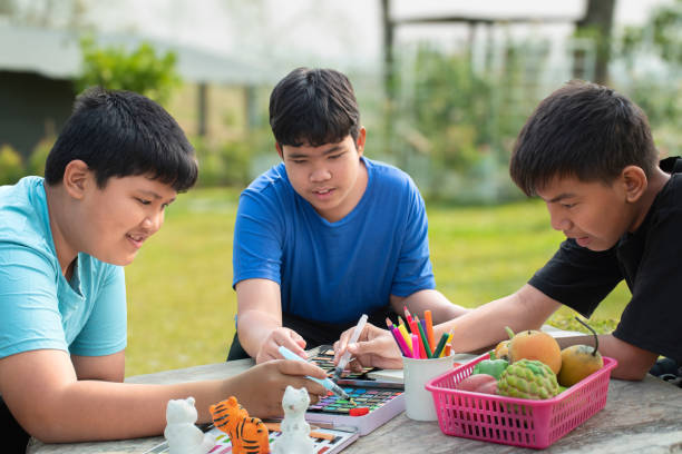 istock Asian boys with painting 2017151935