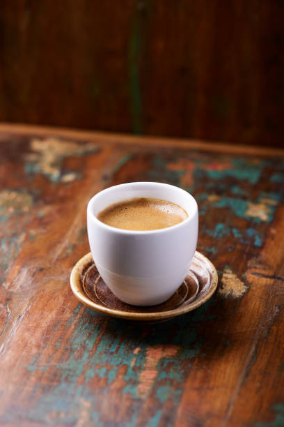 istock Cup of coffee on wooden background. Close up. 2017153500