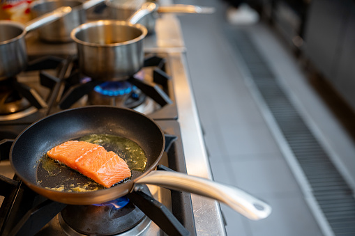 Chef Hand Pan Seared Salmon Fillet