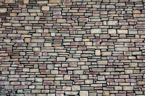 Walls made of stone piles, stone texture background