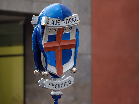Freiburg im Breisgau, Germany - February 12, 2024: Masquerade. Parade carnival symbol of the Club of blue fools - Blaue Narre - in Freibourg im Breisgau, Germany