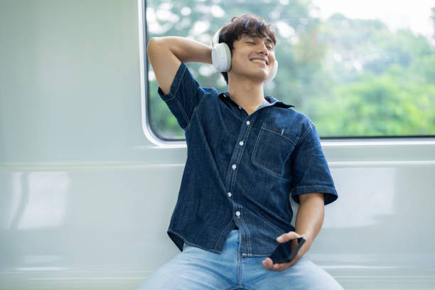 istock Young Asian man on the metro 2017256426