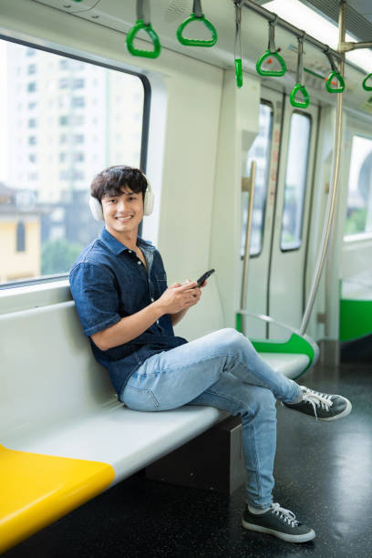 istock Young Asian man on the metro 2017256428