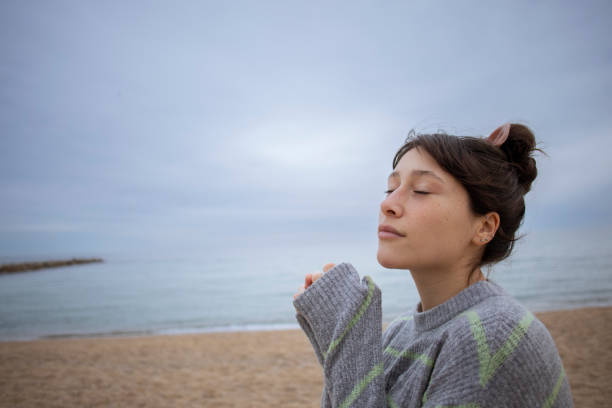 istock Young woman enjoying the beach 2017274320