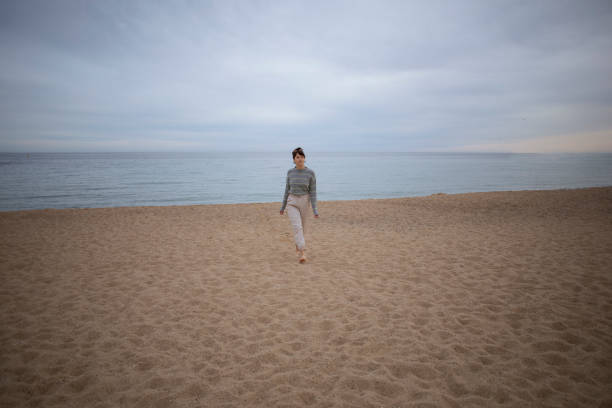 istock Young woman enjoying the beach 2017312490