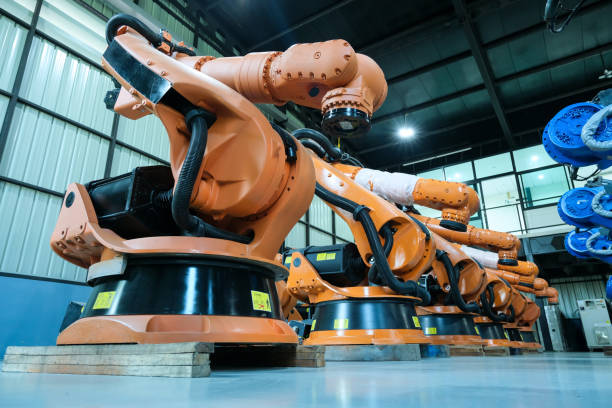 istock Industrial robot arm is placed in preparation for installation in customer's factory. 2017362355