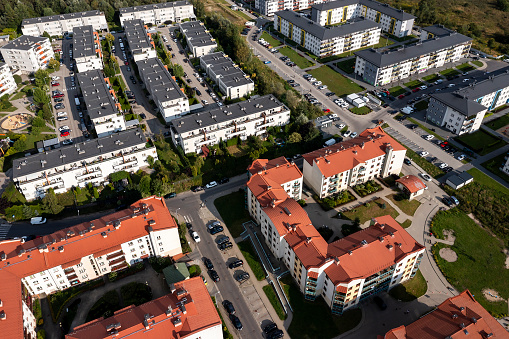 Residential neighborhood with apartment houses seen from above.