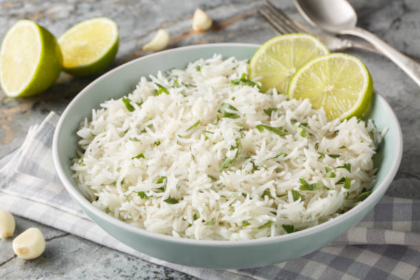 istock Organic cilantro lime rice with garlic and zest close-up in a bowl. Horizontal 2017551269
