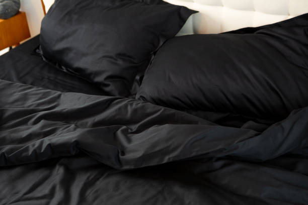 istock Satin linen on pillows and blanket cotton textile morning bedroom 2017558279