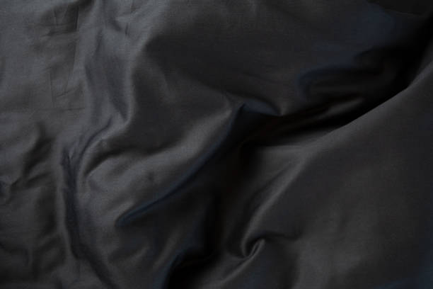 istock Black Satin bedclothes cotton textile morning messy 2017558298